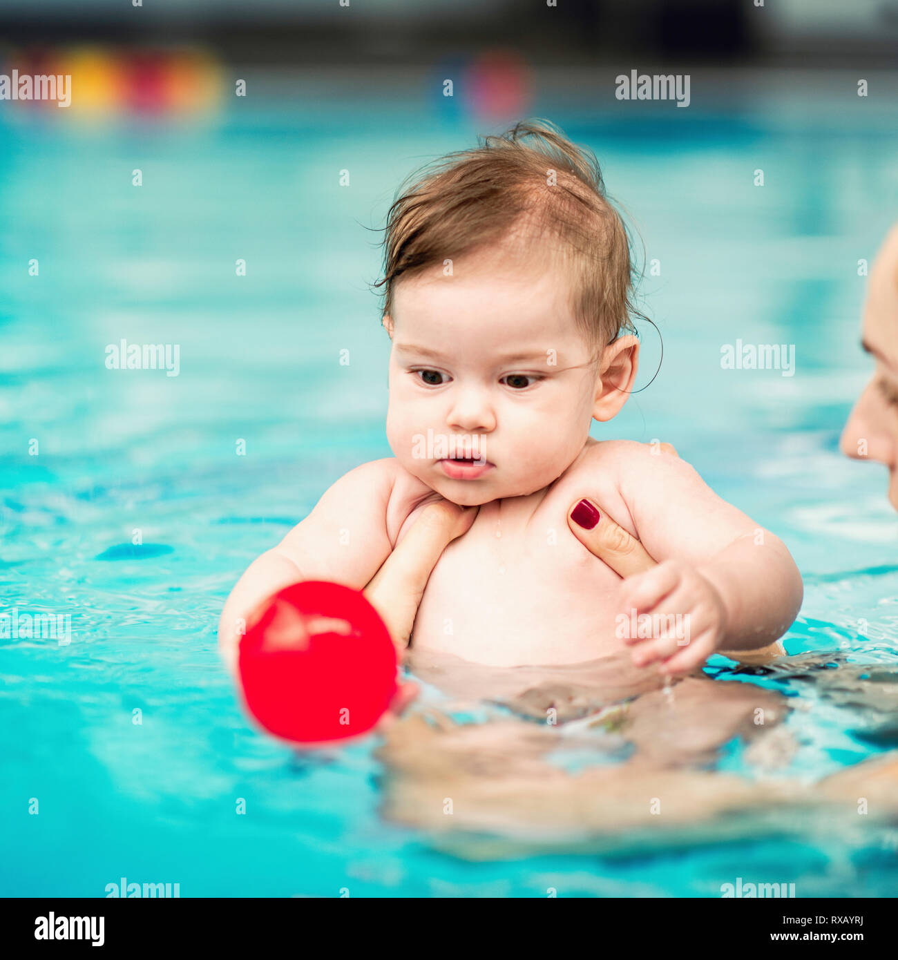 Baby boy in swimming pool Stock Photo Alamy