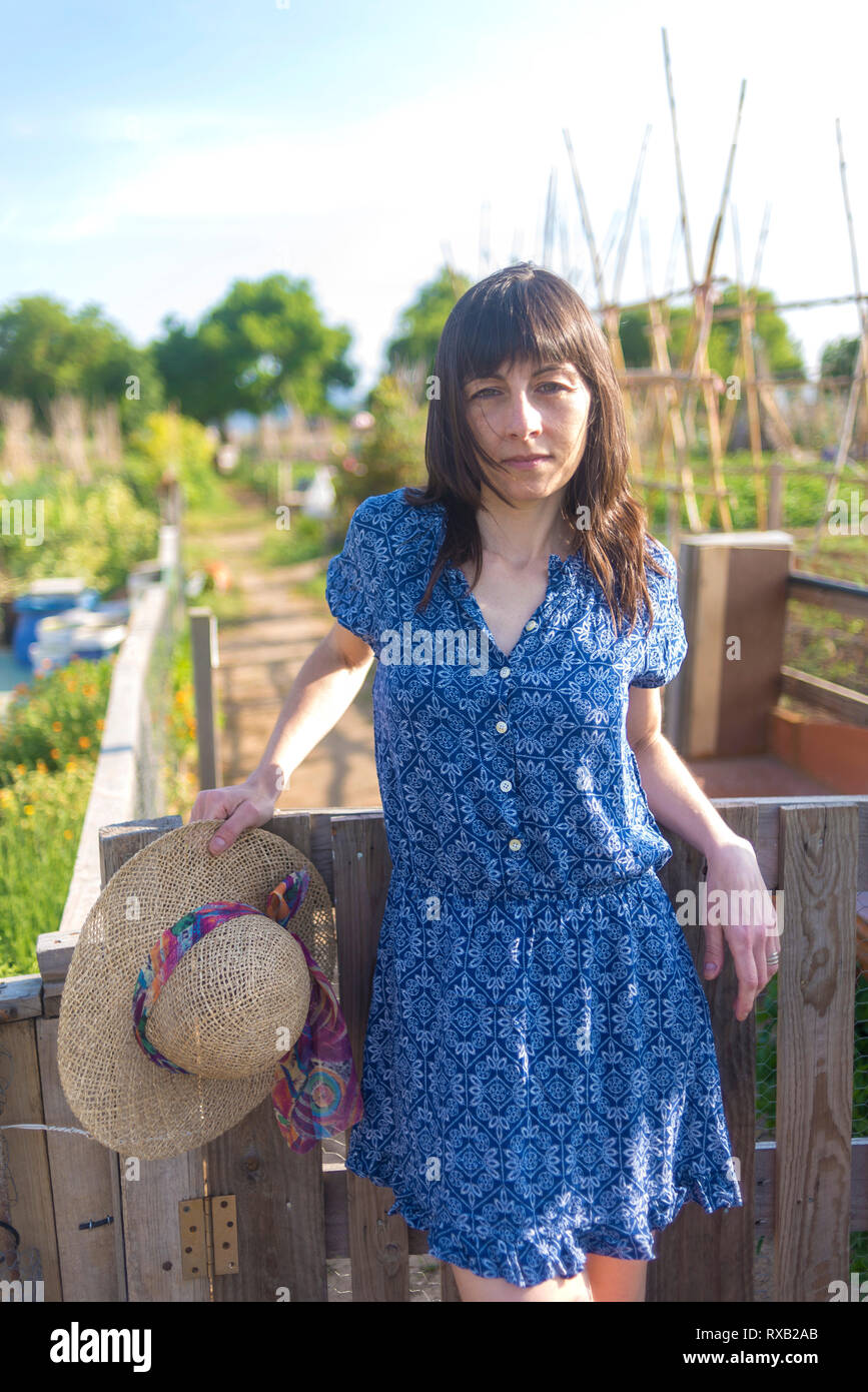 Mature woman and old blue dress hi-res stock photography and images - Alamy