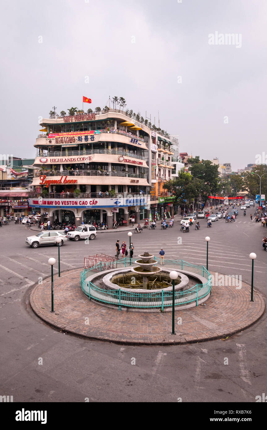 The Highlands Coffee building at Dong Kinh Nghia Thuc Square roundabout junction in Hanoi city, Vietnam Stock Photo