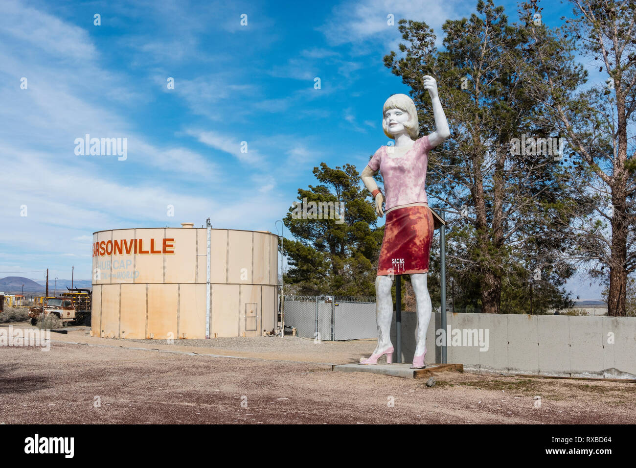 The roadside attraction of Pearsonville, a modern-day ghost town that was known as the 'Hubcap Capital of the World' that has this proclaimed on a hug Stock Photo