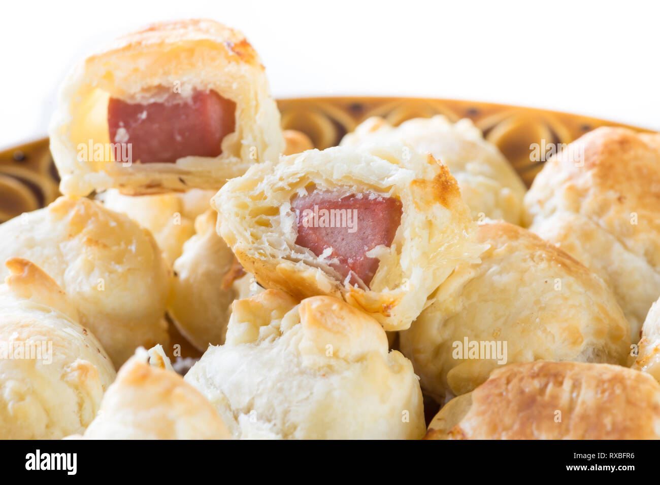 Appetizers. Puff pastry wrapped around a sausage (wurstel) and cheese