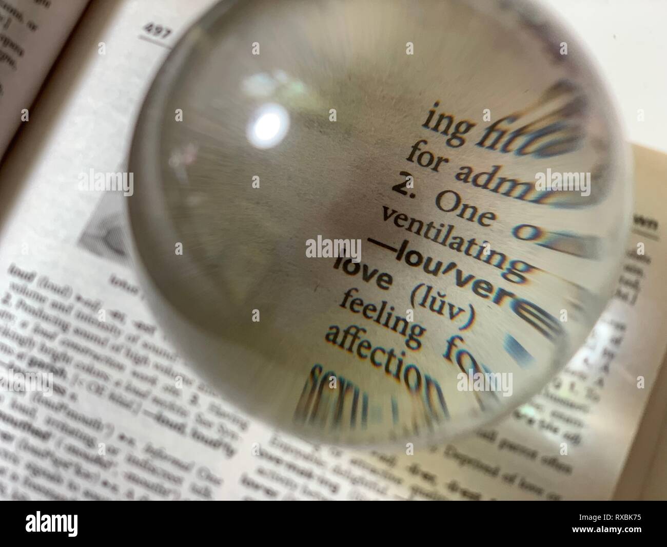 crystal ball on the dictionary Stock Photo Alamy
