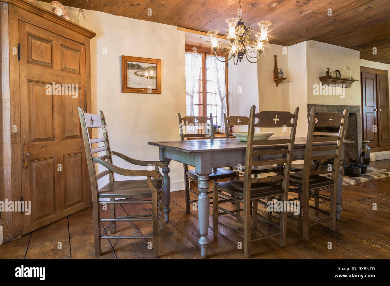 Wooden Dining Table With High Back Chairs In Dining Room With