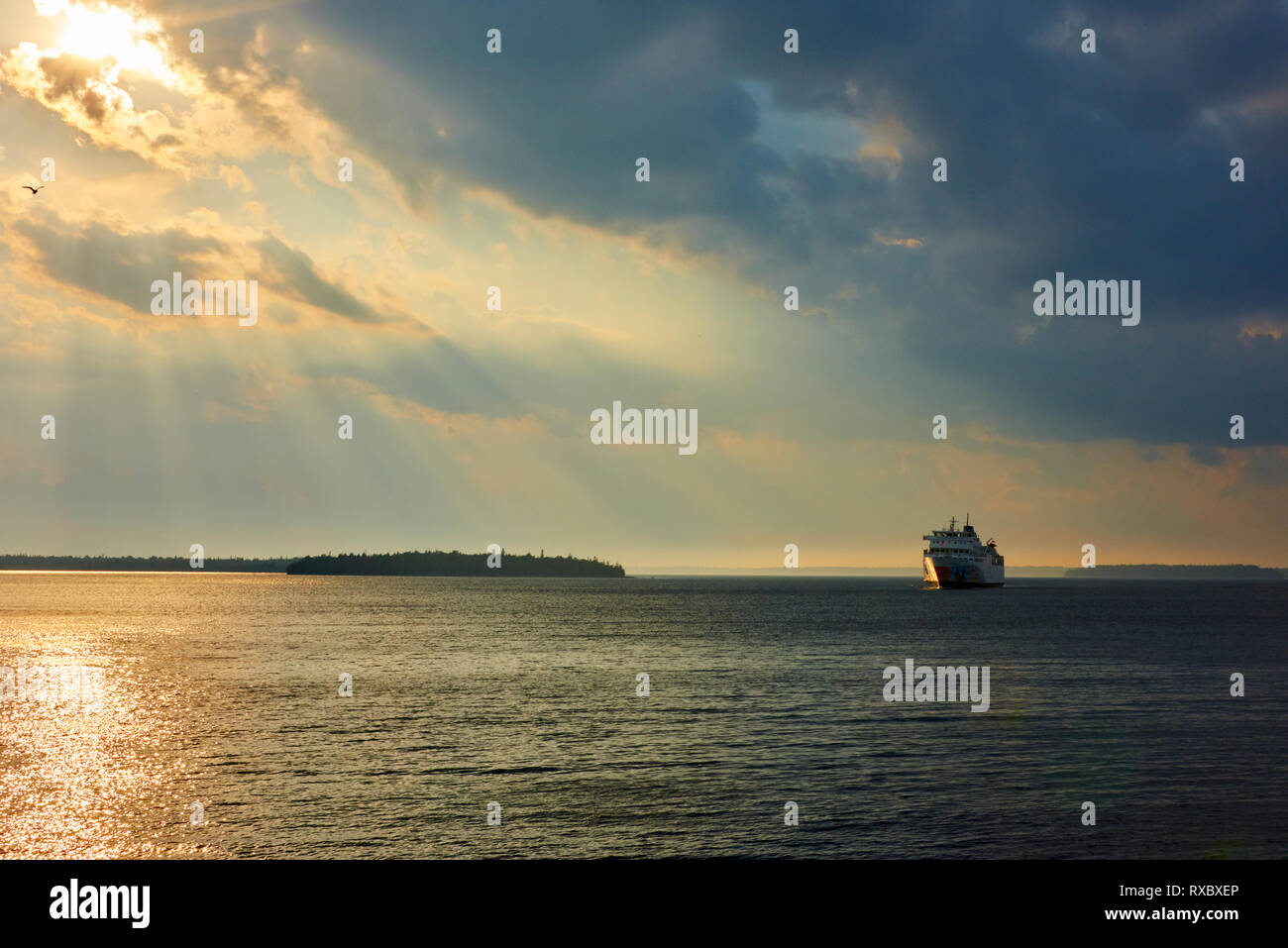 Ferry, ChiCheemaun in the distance approaching Tobermory on a stormy