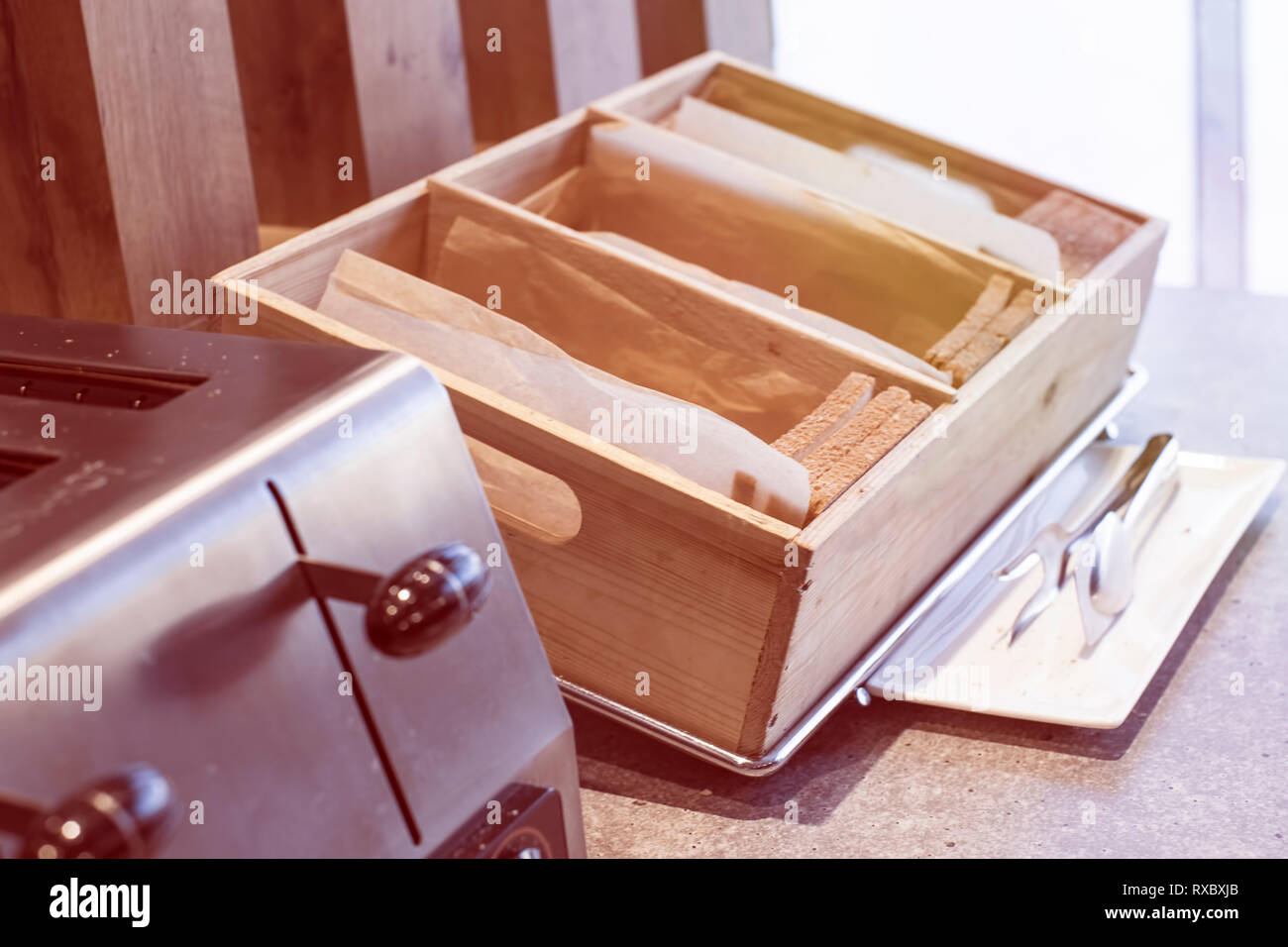 Loaf of bread slice and toaster on morning line buffet in hotel Stock