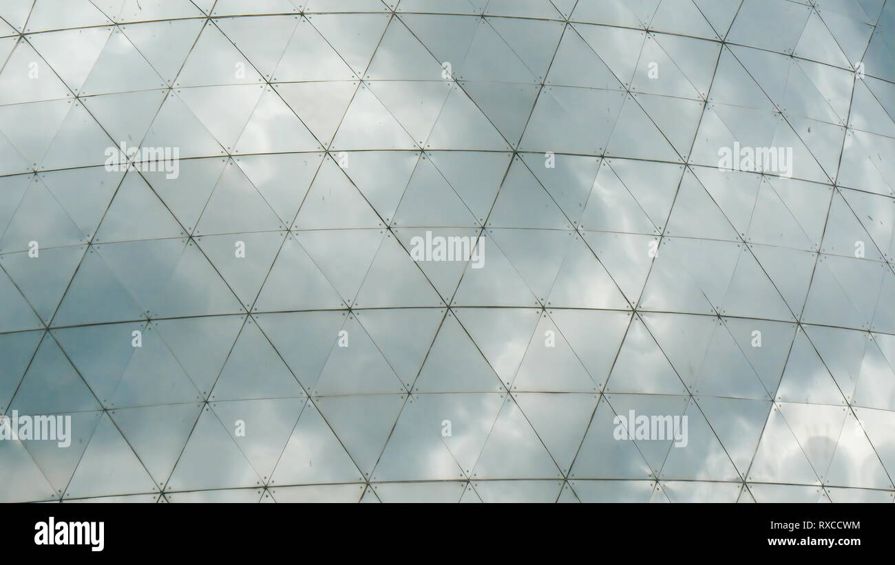 The details of the sphere monument in the park. There are triangle ...