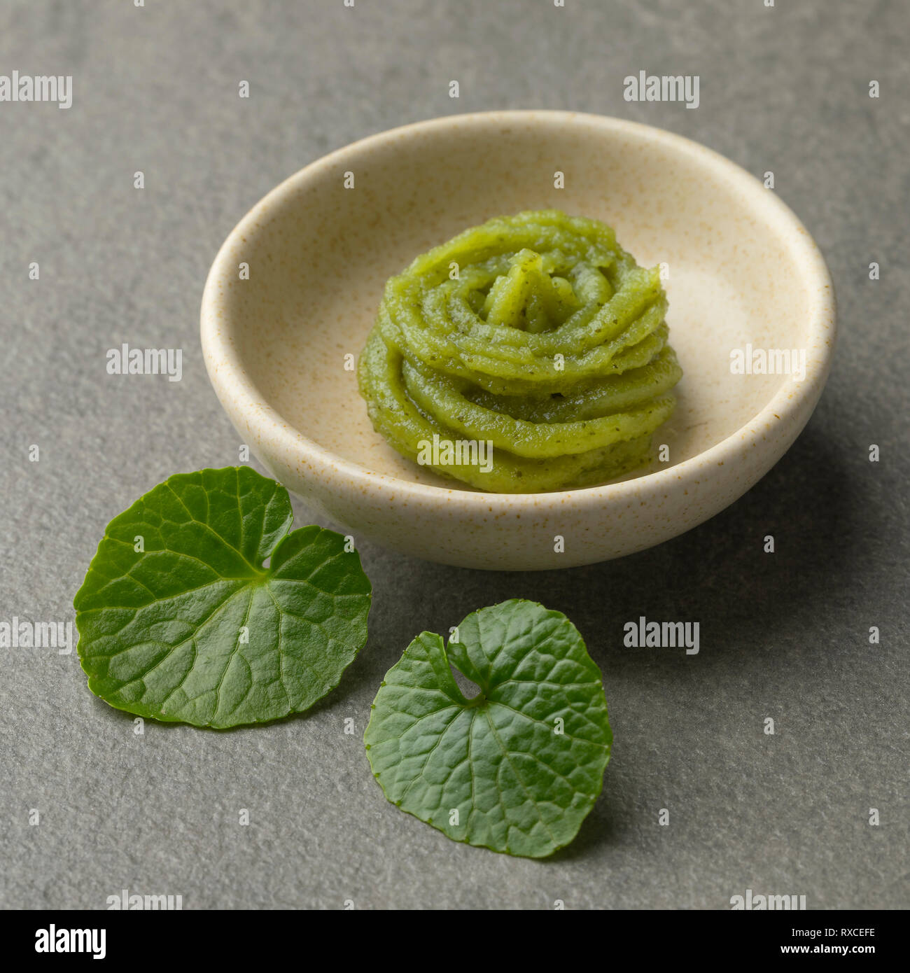 Dish with traditional Japanese horseradish paste and fresh wasabi