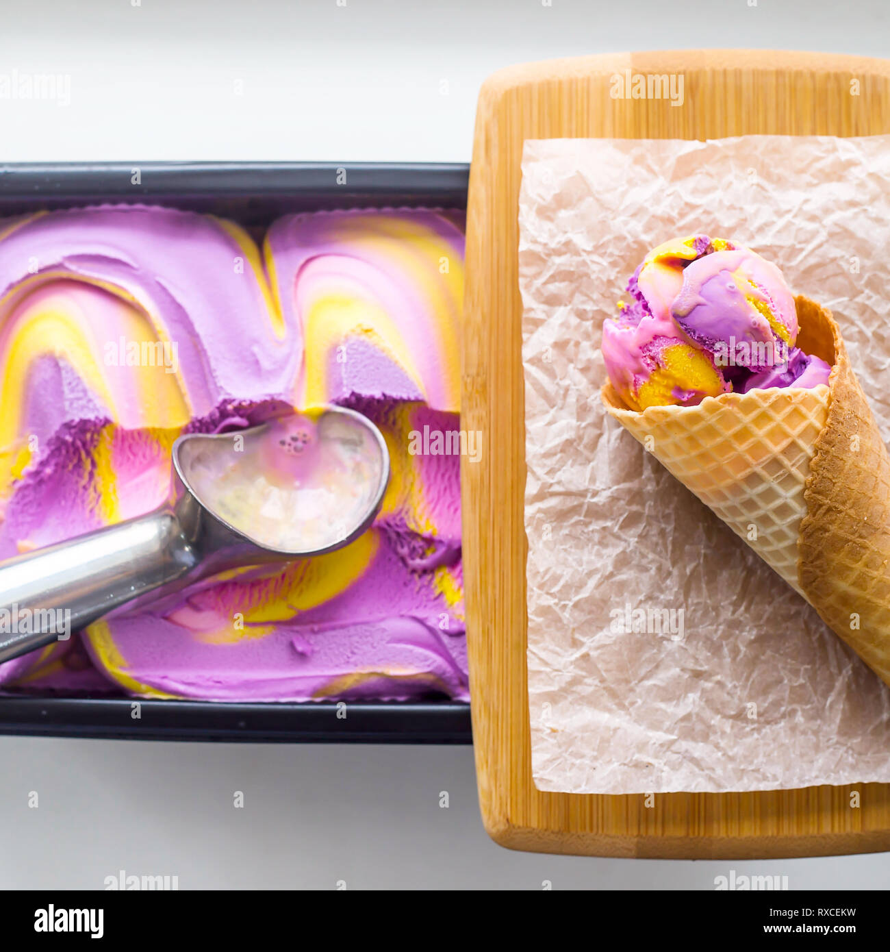Multicolored pink, blue and purple gum flavor ice cream in metallic