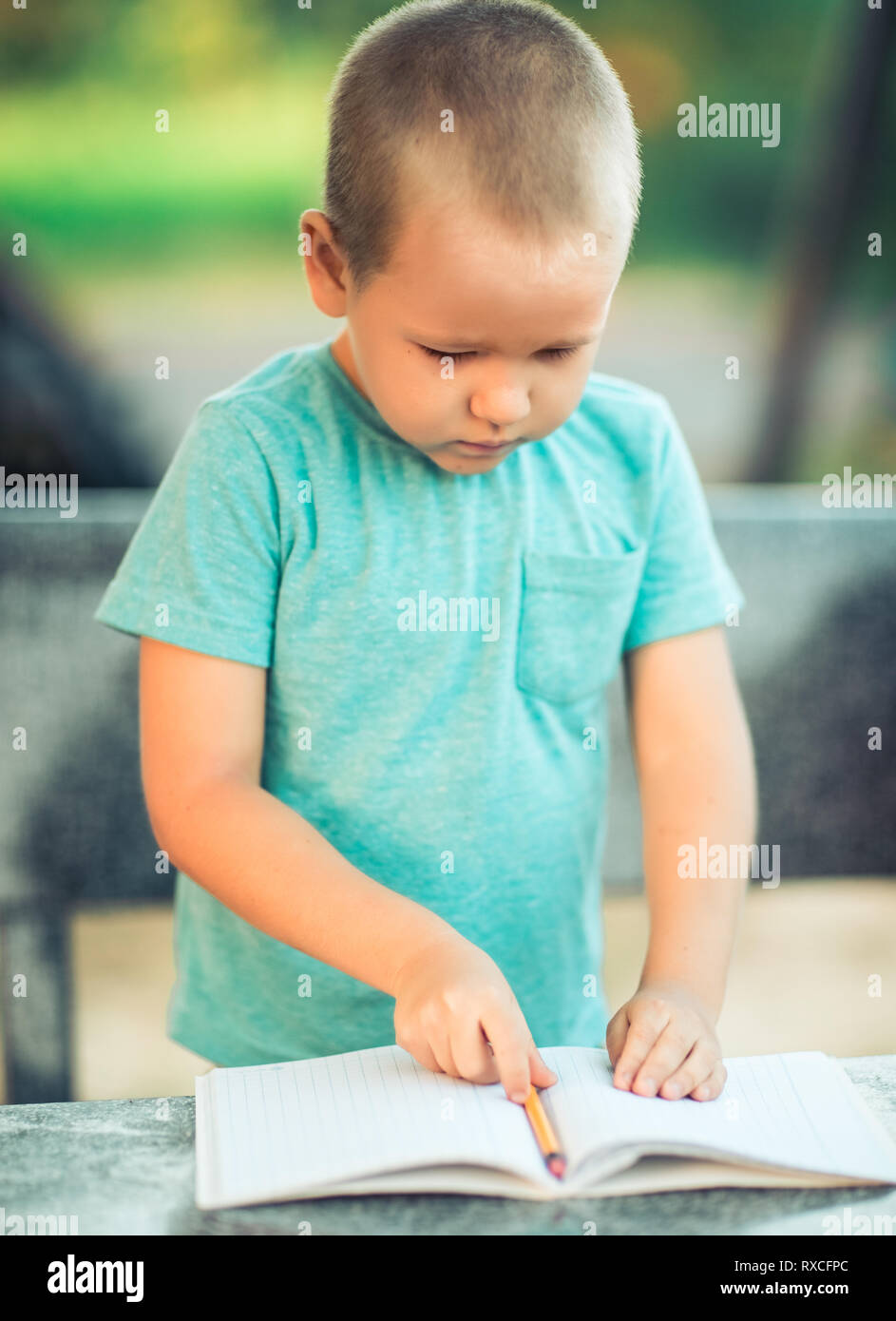 Outdoor portrait of cute little smiling boy Stock Photo - Alamy