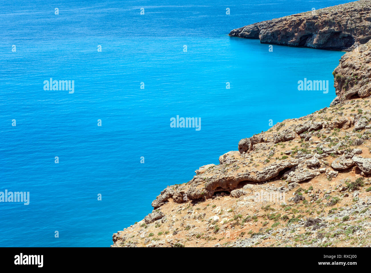 View of the southern coast of Crete on the way to Sweetwater Beach between the villages of Hora Sfakion and Loutro. Stock Photo