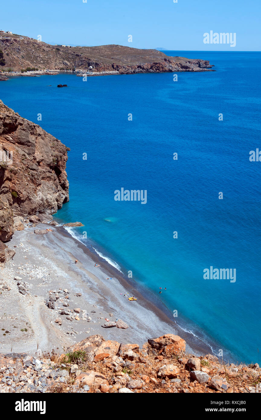 View over secluded Ilingas Beach between the villages of Hora Sfakion and Loutro on the southern coast of the Greek island of Crete. Stock Photo