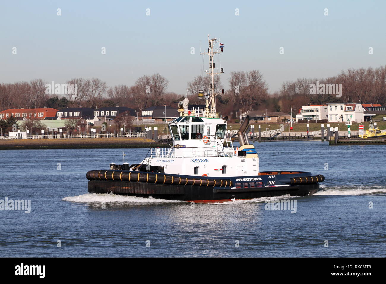 The harbor tug Venus works on 15 February 2019 in the port of Rotterdam. Stock Photo