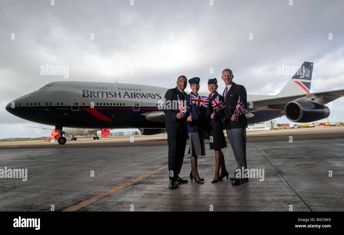 left to right) Anthony Powell, Stephanie Jones, Claire Parsons and Derek  Tennant stand in front of a Boeing 747 in British Airways Landor livery,  part of British Airways' centenary fleet, which arrived