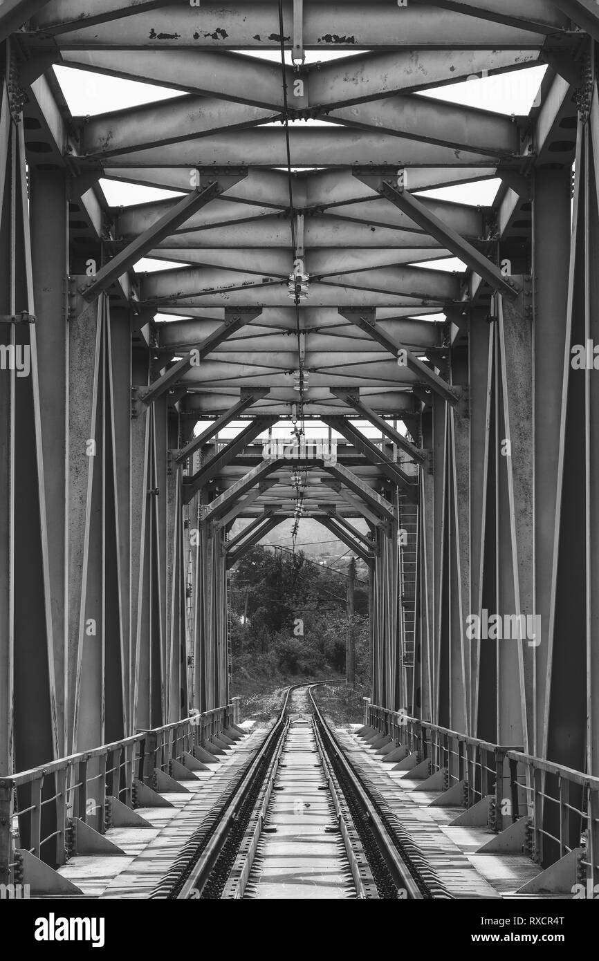 industrial landscape with railway bridge, black white photo Stock Photo