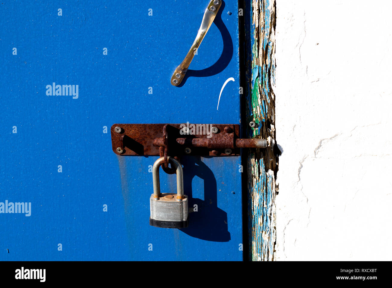 Dilapidated Rotten Door Frame With Broken Latch On Derelict