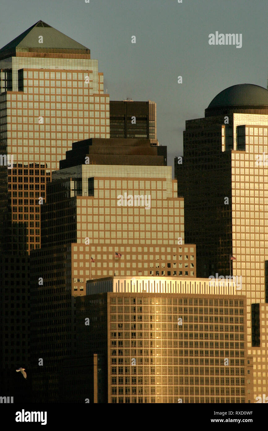 Sunset at Jersey City marina, overlooking Hudson River. In the back,buildings of  Brookfield Place complex (World Financial Center), in Manhattan, NY. Stock Photo