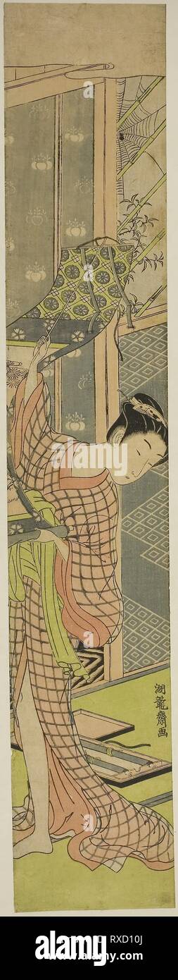 Young Woman Hanging a Painting. Isoda Koryusai; Japanese, 1735-1790. Date: 1766-1776. Dimensions: . Color woodblock print; hashira-e. Origin: Japan. Museum: The Chicago Art Institute. Stock Photo