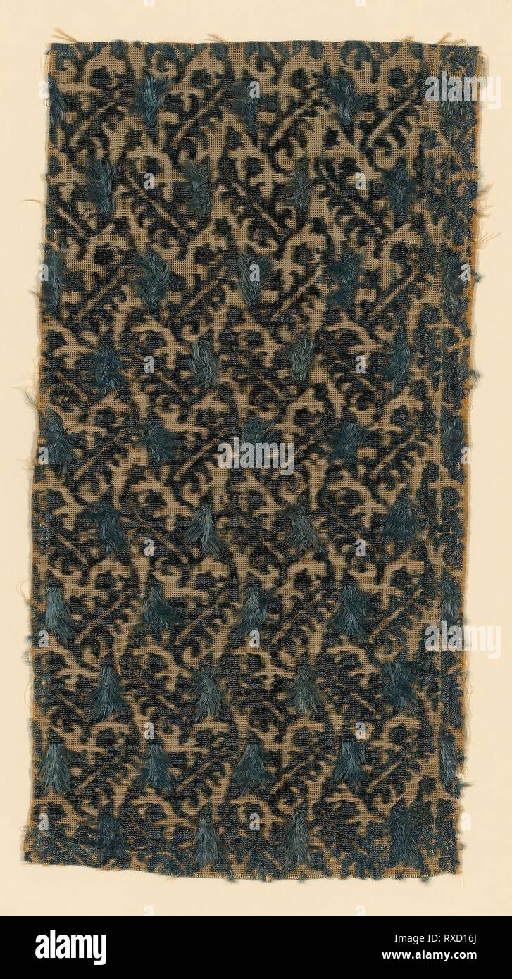 Fragment. Italy. Date: 1601-1635. Dimensions: 27.9 x 14.2 cm (11 x 5 5/8 in.). Silk, plain weave with supplementary pile warps forming cut, uncut, and voided velvet. Origin: Italy. Museum: The Chicago Art Institute. Stock Photo