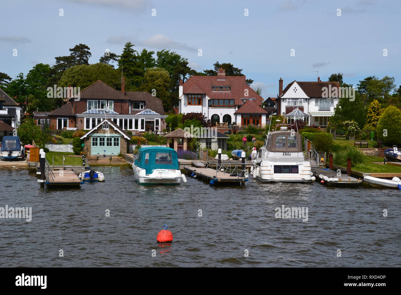 Houses on the riverside near Oulton Broad, Suffolk, UK Stock Photo
