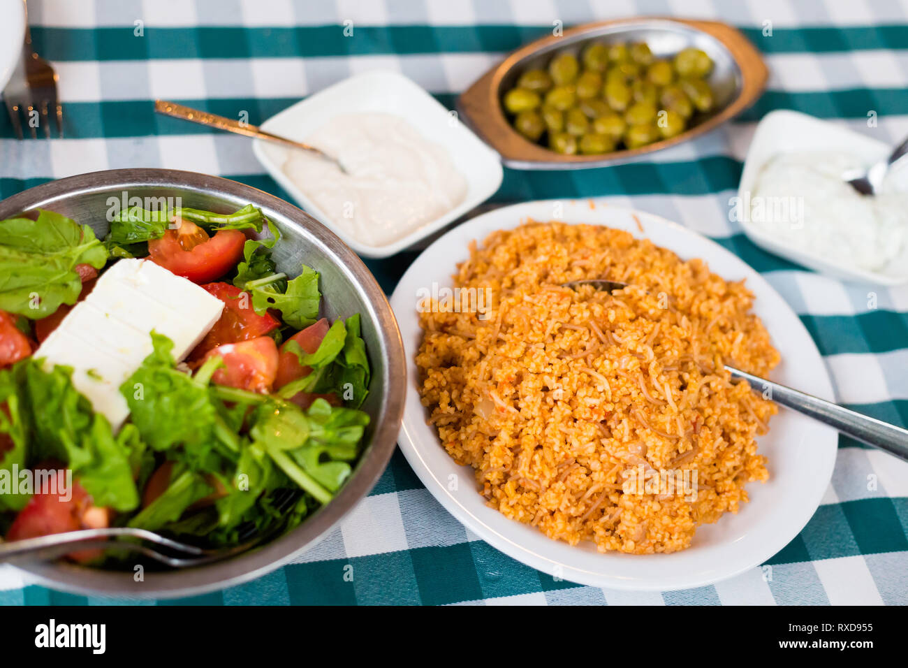 Food selection  in local restaurant in Larnaca. Traditional cypriot meze food on Cyprus island. Stock Photo