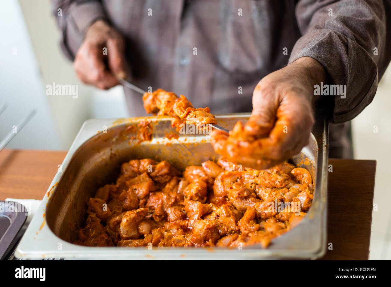 Preparing turkish kebab in local restaurant in Nicosia. Traditional cypriot food on Cyprus island. Stock Photo