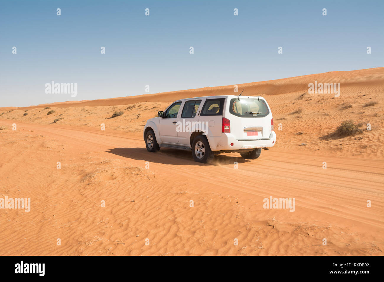 Off-road vehicle on a track in the Wahiba Sand Desert (Oman) Stock Photo