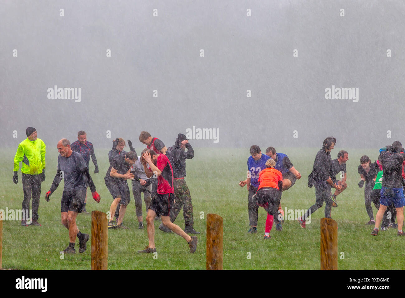 Northampton, UK. 9th March 2019. After a sunny start to the day, heavy rain came in midmorning soaking the people doing their keep fit classes in Abington Park. Credit: Keith J Smith./Alamy Live News Stock Photo