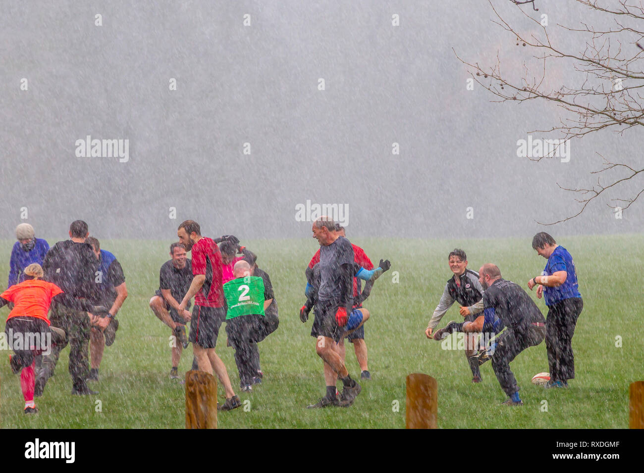 Northampton, UK. 8th March 2019. After a sunny start to the day, heavy rain came in midmorning soaking the people doing their keep fit classes in Abington Park. Credit: Keith J Smith./Alamy Live News Stock Photo
