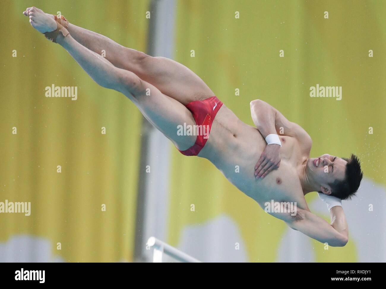 Beijing, China. 9th Mar, 2019. Chen Aisen of China competes during the men's 10m platform final at the FINA Diving World Series 2019 at the National Aquatics Center in Beijing, capital of China, March 9, 2019. Credit: Jia Haocheng/Xinhua/Alamy Live News Stock Photo