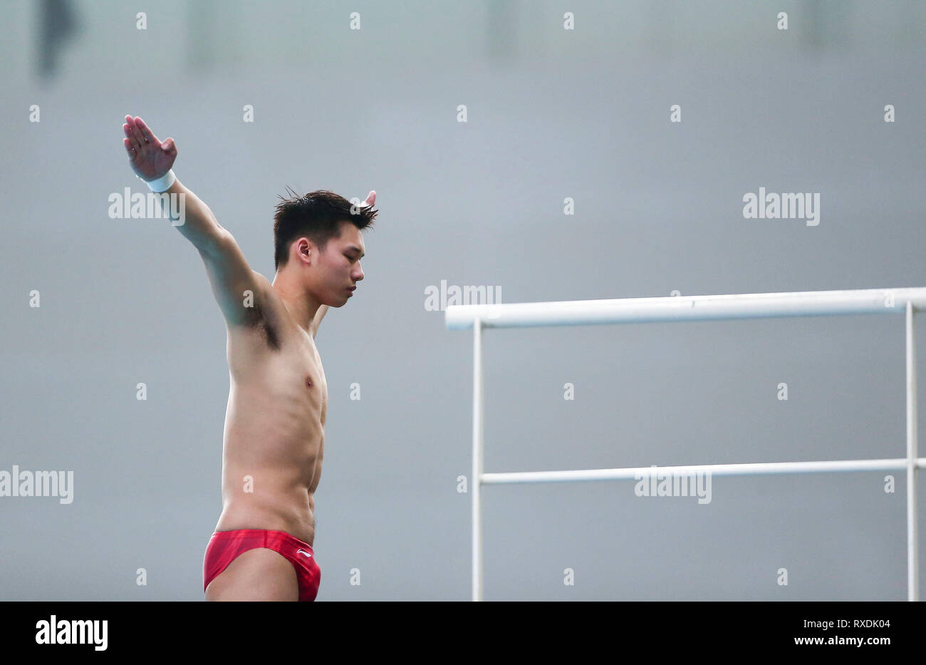 Beijing, China. 9th Mar, 2019. Chen Aisen of China competes during the men's 10m platform final at the FINA Diving World Series 2019 at the National Aquatics Center in Beijing, capital of China, March 9, 2019. Credit: Luo Yuan/Xinhua/Alamy Live News Stock Photo