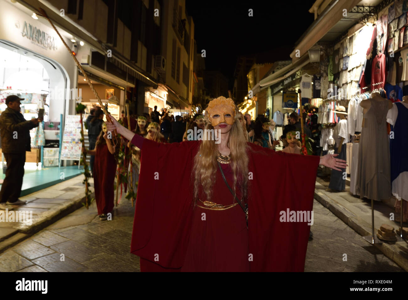 Athens, Greece. 9th Mar 2019. Participants march through the historic center of Athens to celebrate the ancient Greek festival phalliphoria honoring the god of wine, fertility and theater Dionysus in Athens, Greece. Credit: Nicolas Koutsokostas/Alamy Live News. Stock Photo