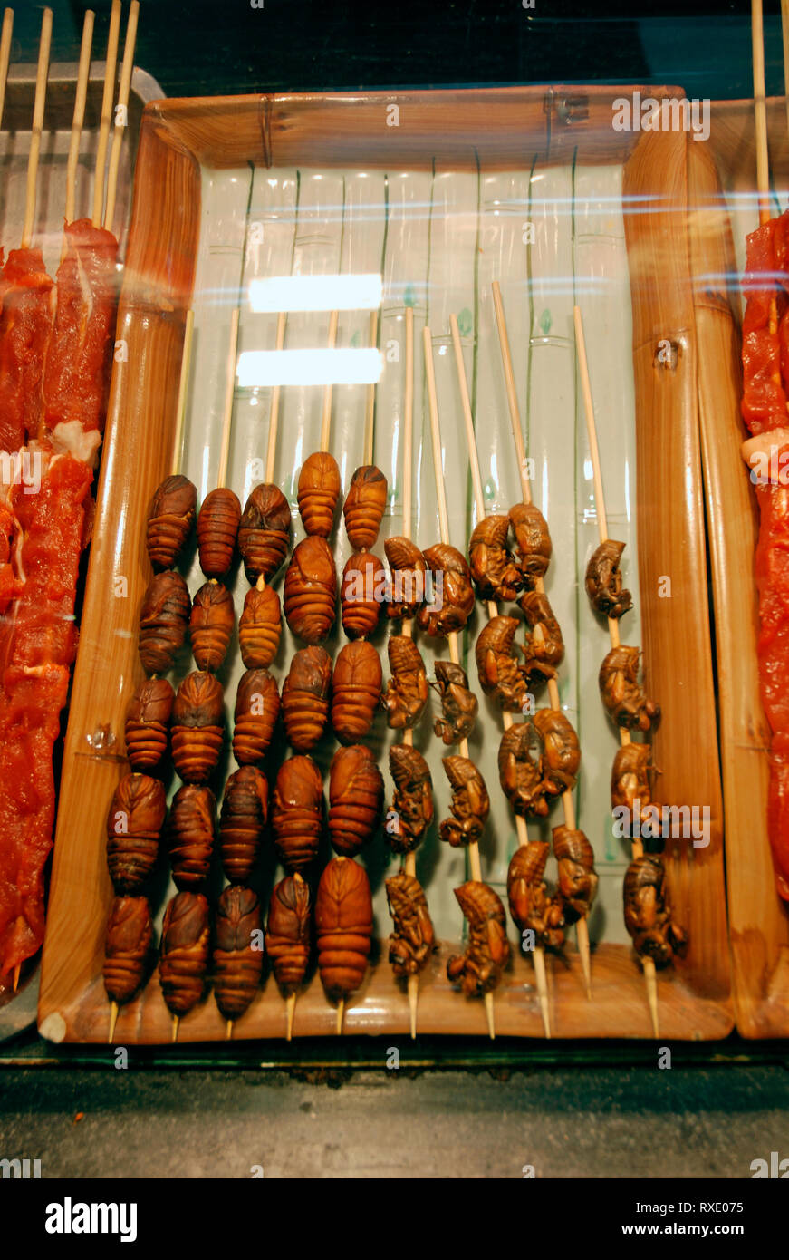 Fried cicadas at a night market in Wangfujing area, Beijing, China Stock Photo