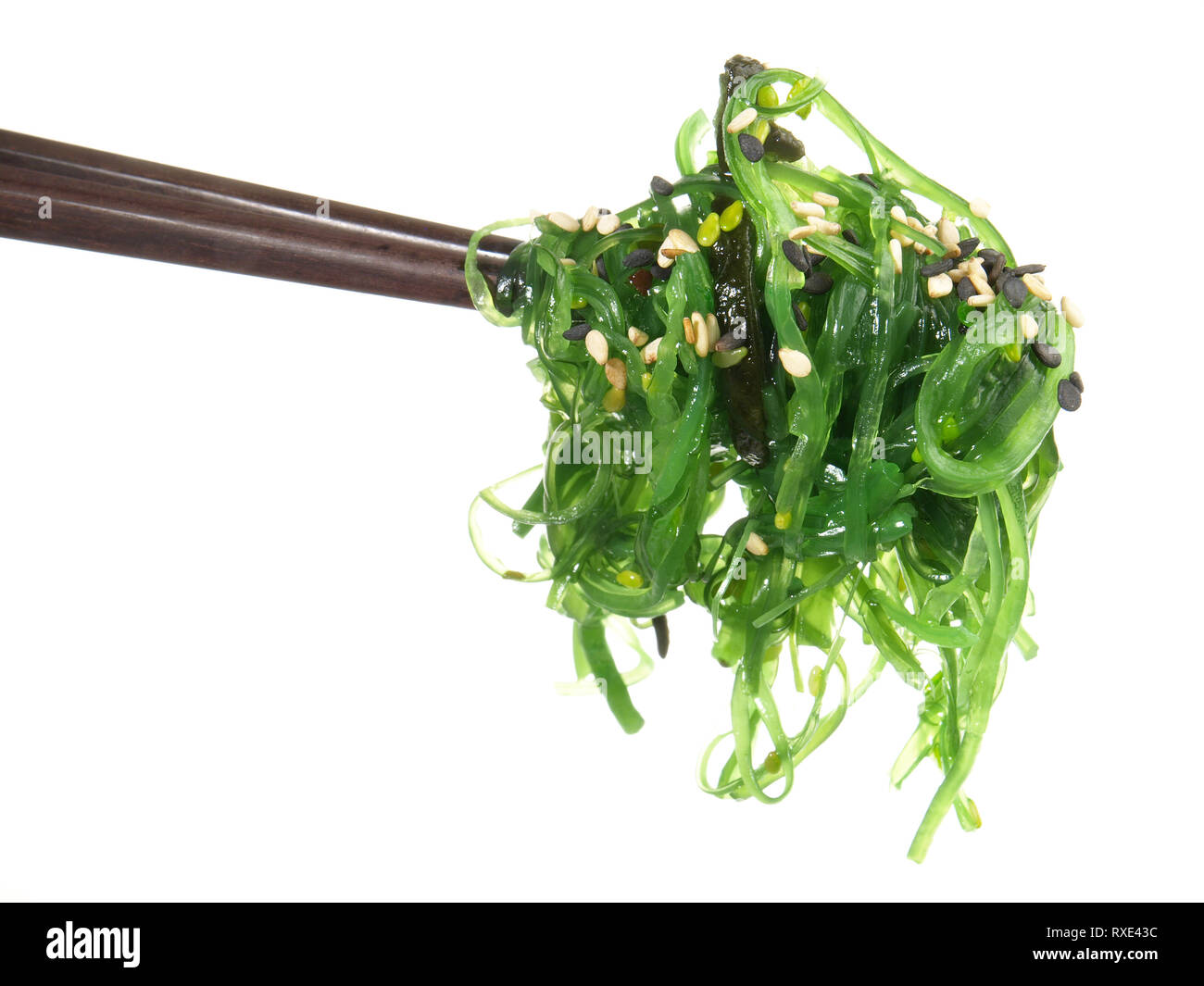Seaweed Salad with Chopsticks - Healthy Nutrition on white Background Stock Photo