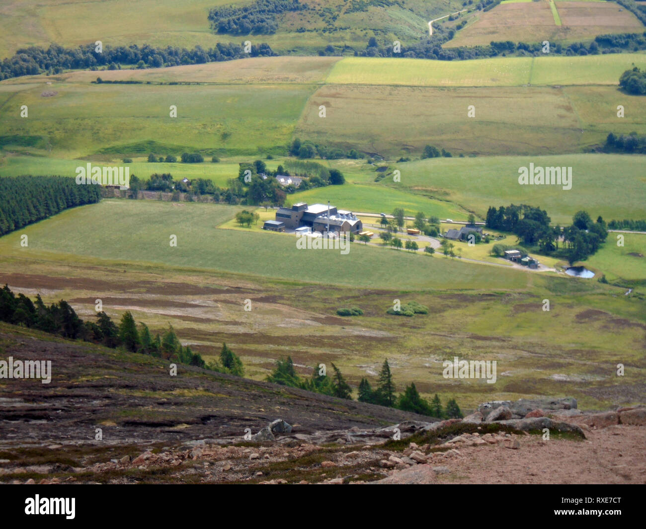 The Allt-a-Bhainne Whiskey Distillery from Roy's Hill on Route to the Scottish Mountain Corbett Ben Rinnes, Cairngorm National Park, Scotland. Stock Photo