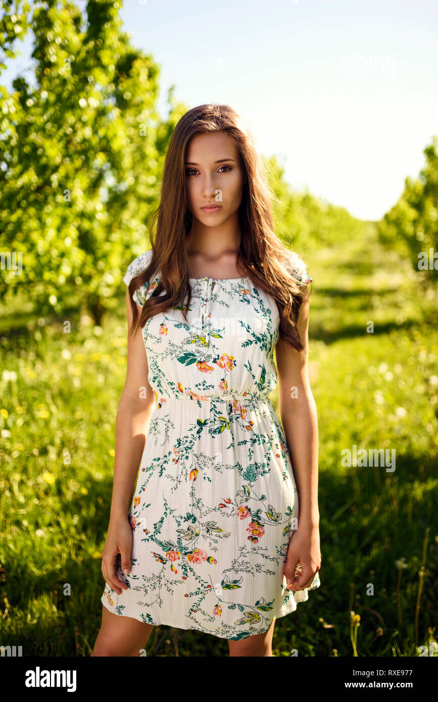 The Beautiful Girl In Summer Dress Isolated Stock Photo, Picture and  Royalty Free Image. Image 13079100.