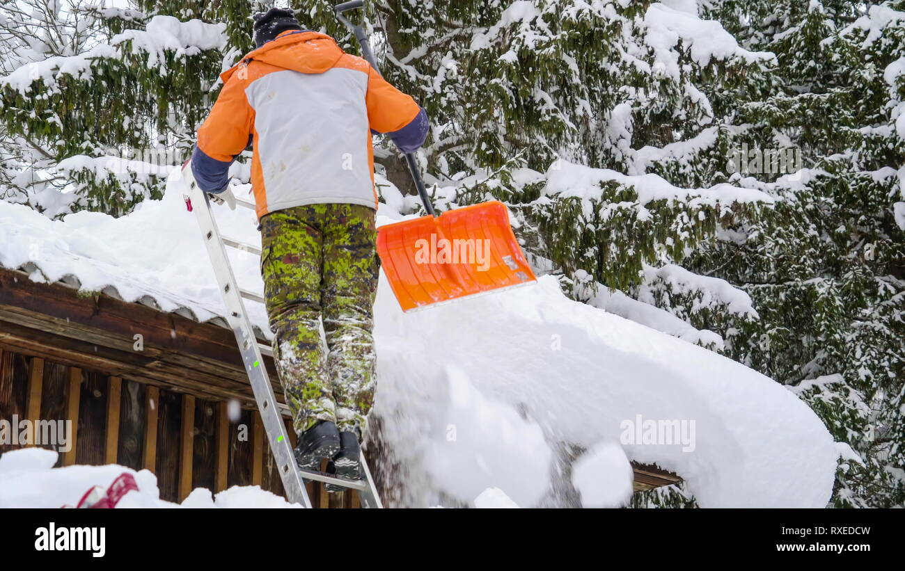Man climbing ice fall hi-res stock photography and images - Alamy