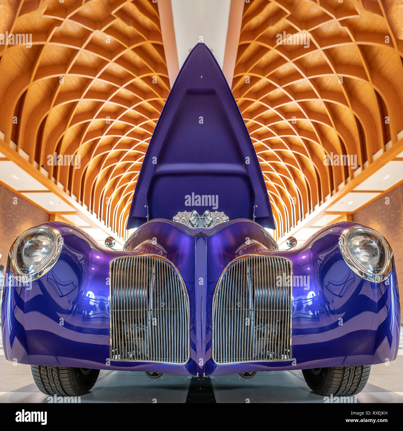 THE HAGUE/NETHERLANDS-JUNE 24, 2018: A spectacular purple concept car at a classic car meeting. The hood is opened for the public to see the motor. Stock Photo