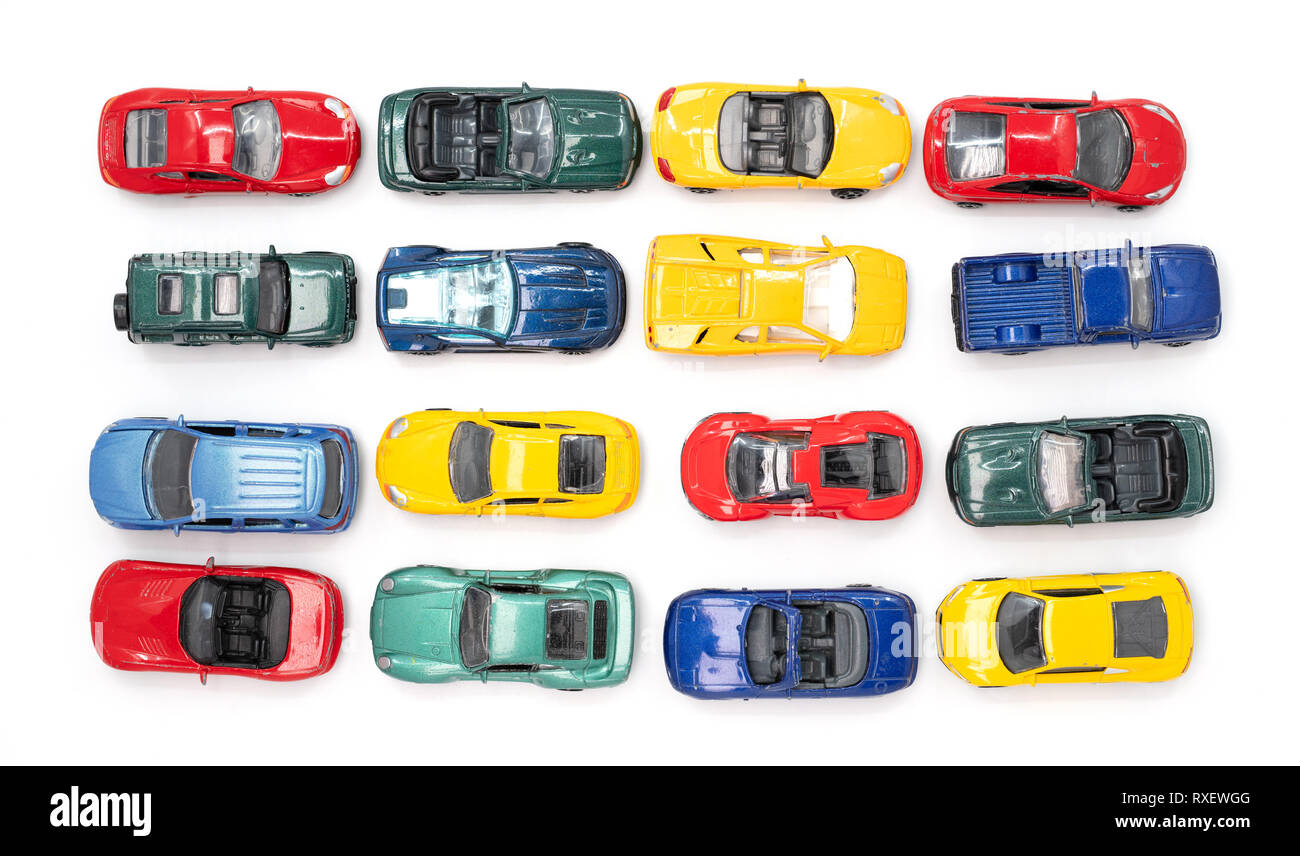 Toy cars in neat rows of the four primary colours Stock Photo