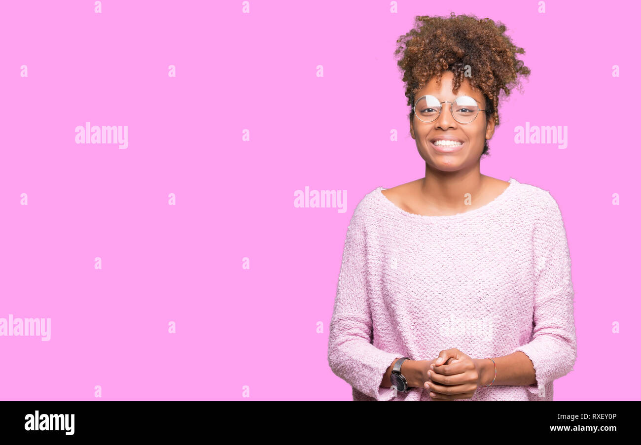 Beautiful young african american woman wearing glasses over isolated ...