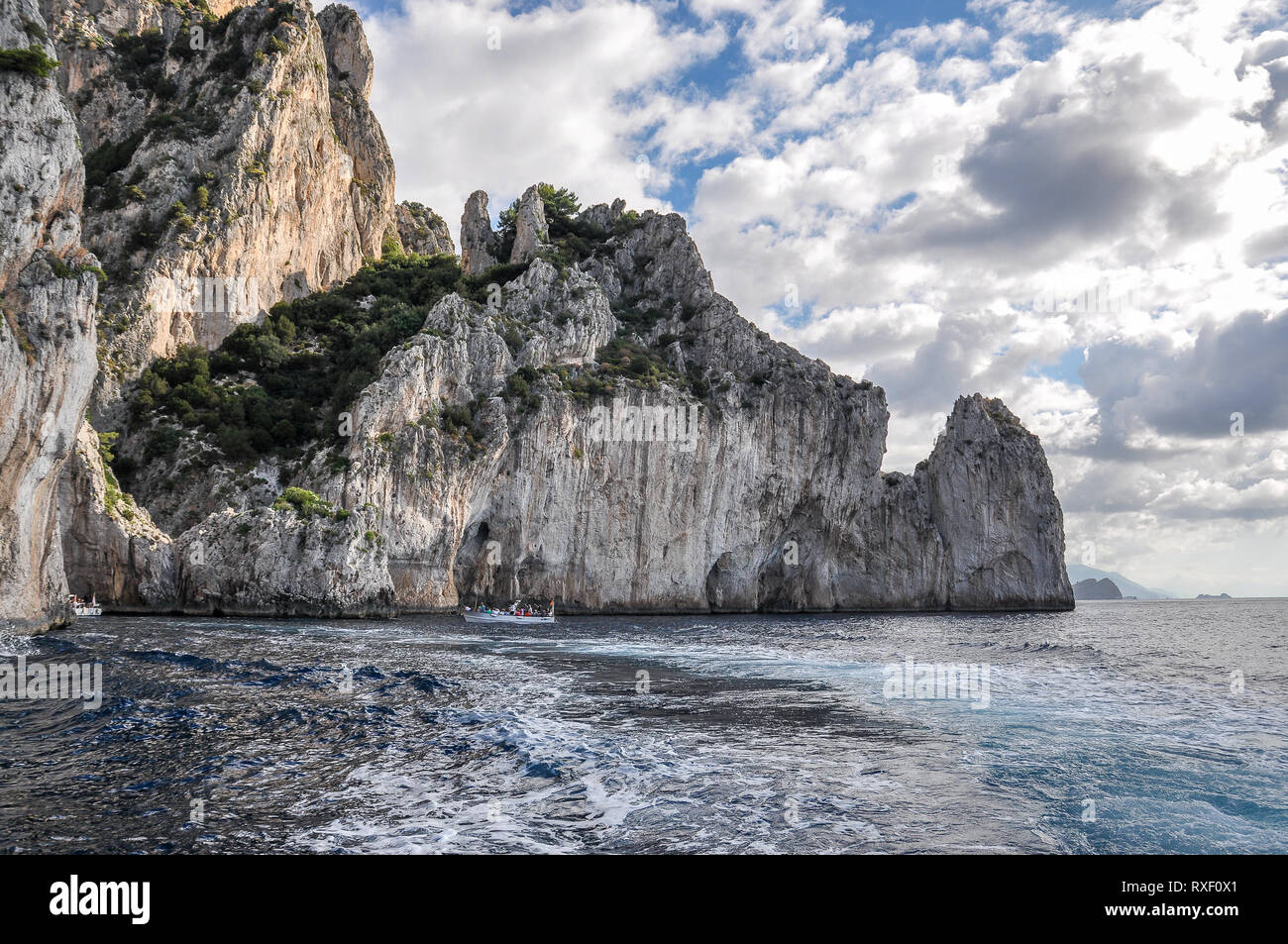 Vertical walls of the rocky coast of the island of Capri, Italy Stock Photo