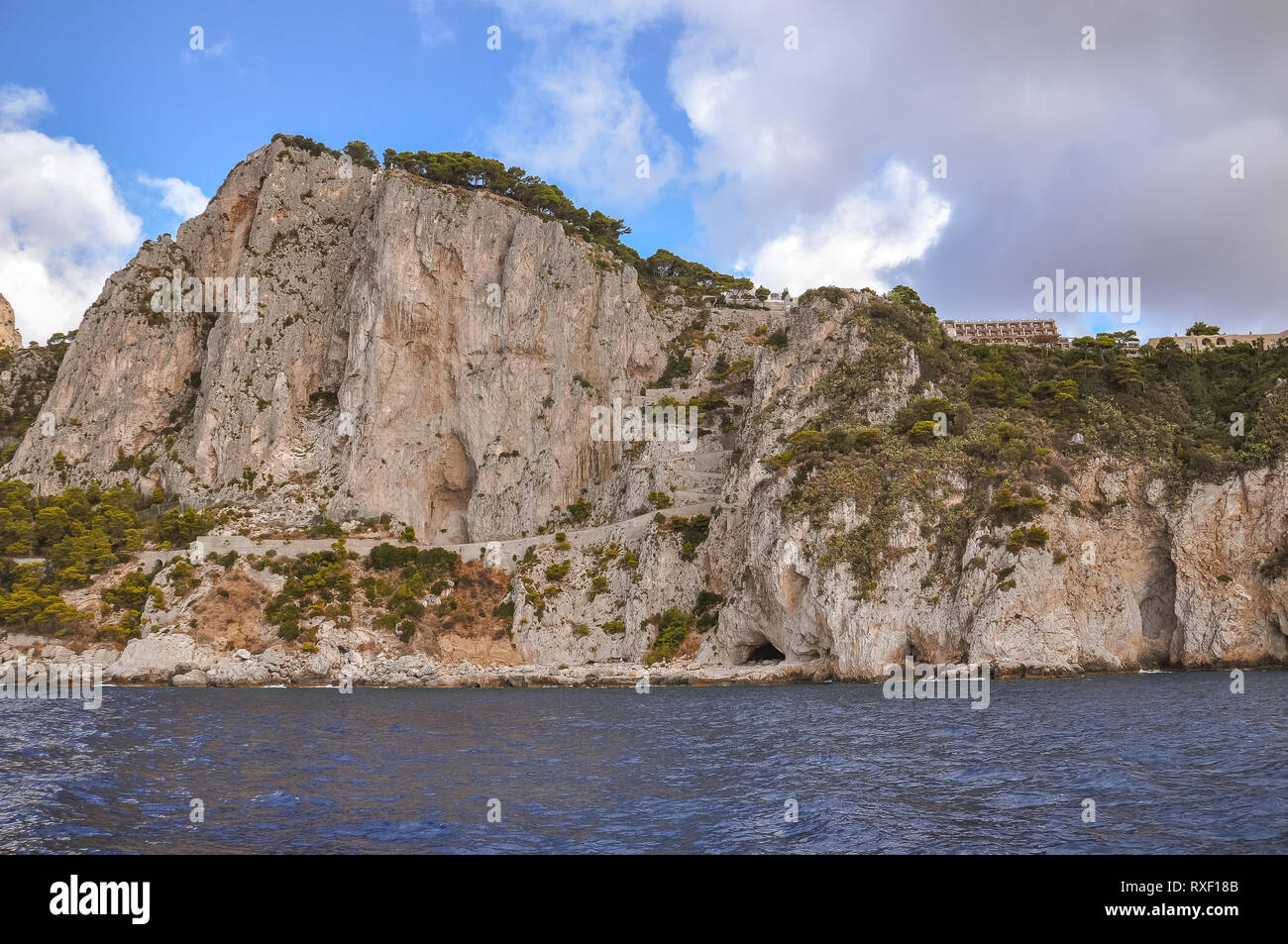 Vertical cliffs of the coast of the island of Capri, Italy Stock Photo