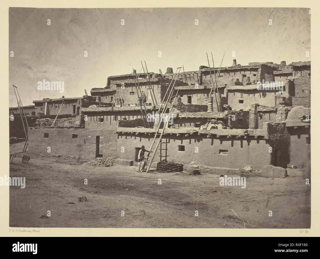 Section of the South Side of Zuni Pueblo, N.M. Timothy O'Sullivan; American, born Ireland, 1840-1882. Date: 1873. Dimensions: 20 x 27.4 cm (image/paper); 38.2 x 49.8 cm (album page). Albumen print, from the album 'Geographical & Geological Explorations & Surveys West of the 100th Meridian,' vol. 2. Origin: United States. Museum: The Chicago Art Institute. Stock Photo