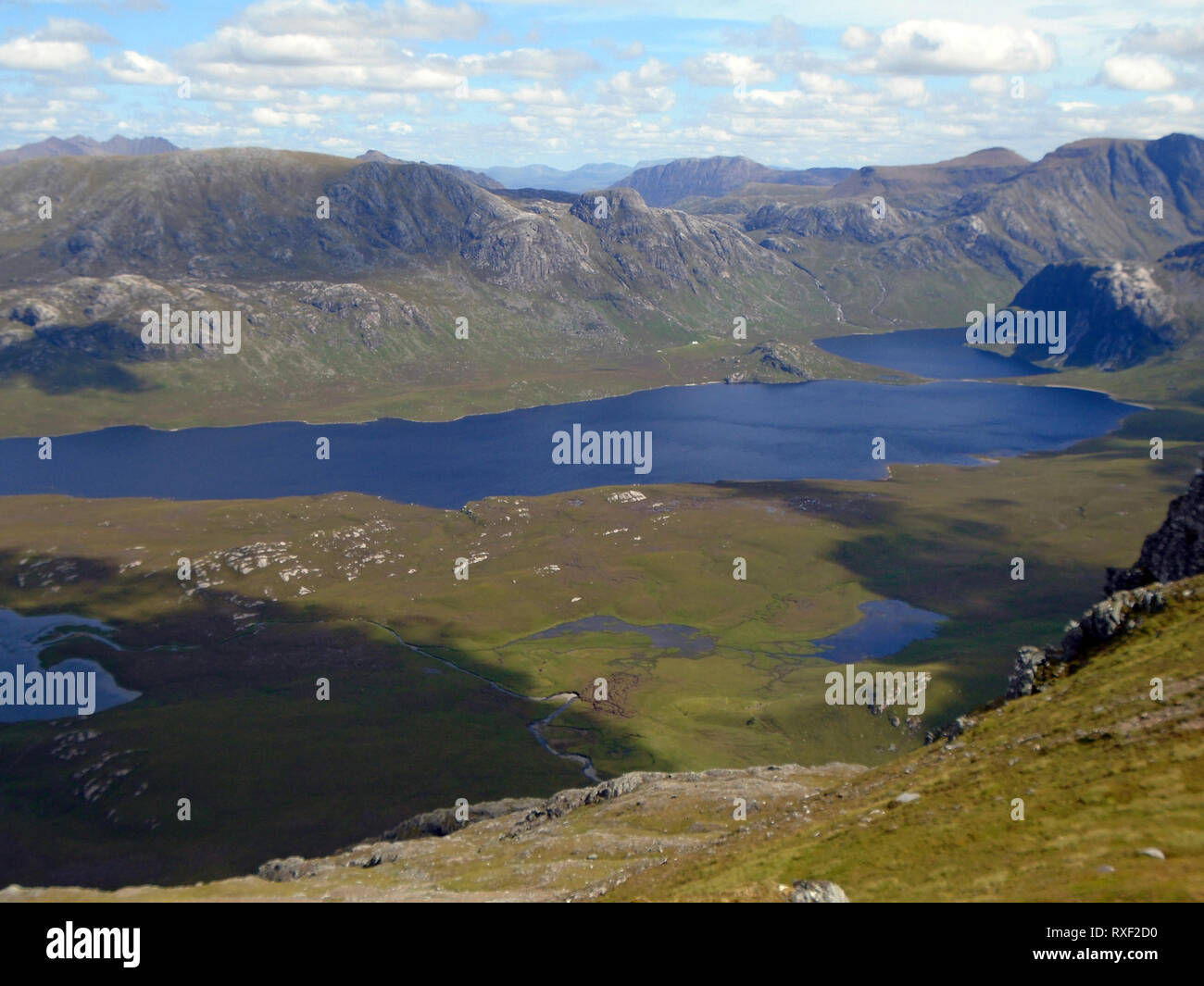 Fionn Loch, Dubh Loch and the Fisherfield Mountains from the Summit of the Corbett Beinn Airigh Charr in the North West Highlands of Scotland, UK. Stock Photo