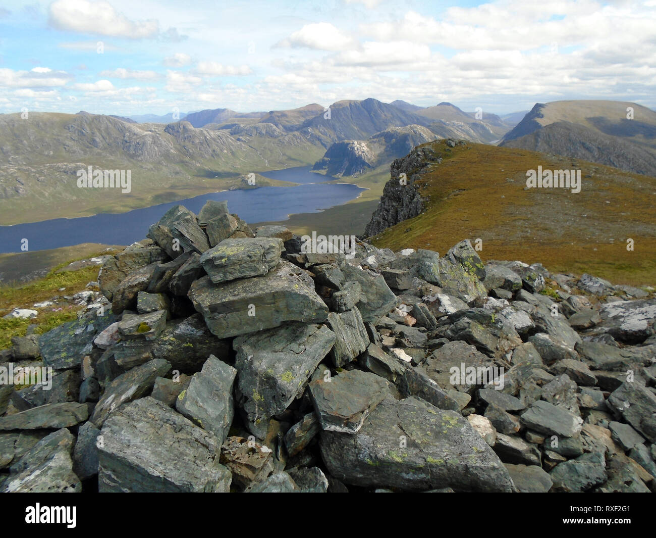 Fionn Loch, Dubh Loch and the Fisherfield Mountains from the Summit of the Corbett Beinn Airigh Charr in the North West Highlands of Scotland, UK. Stock Photo