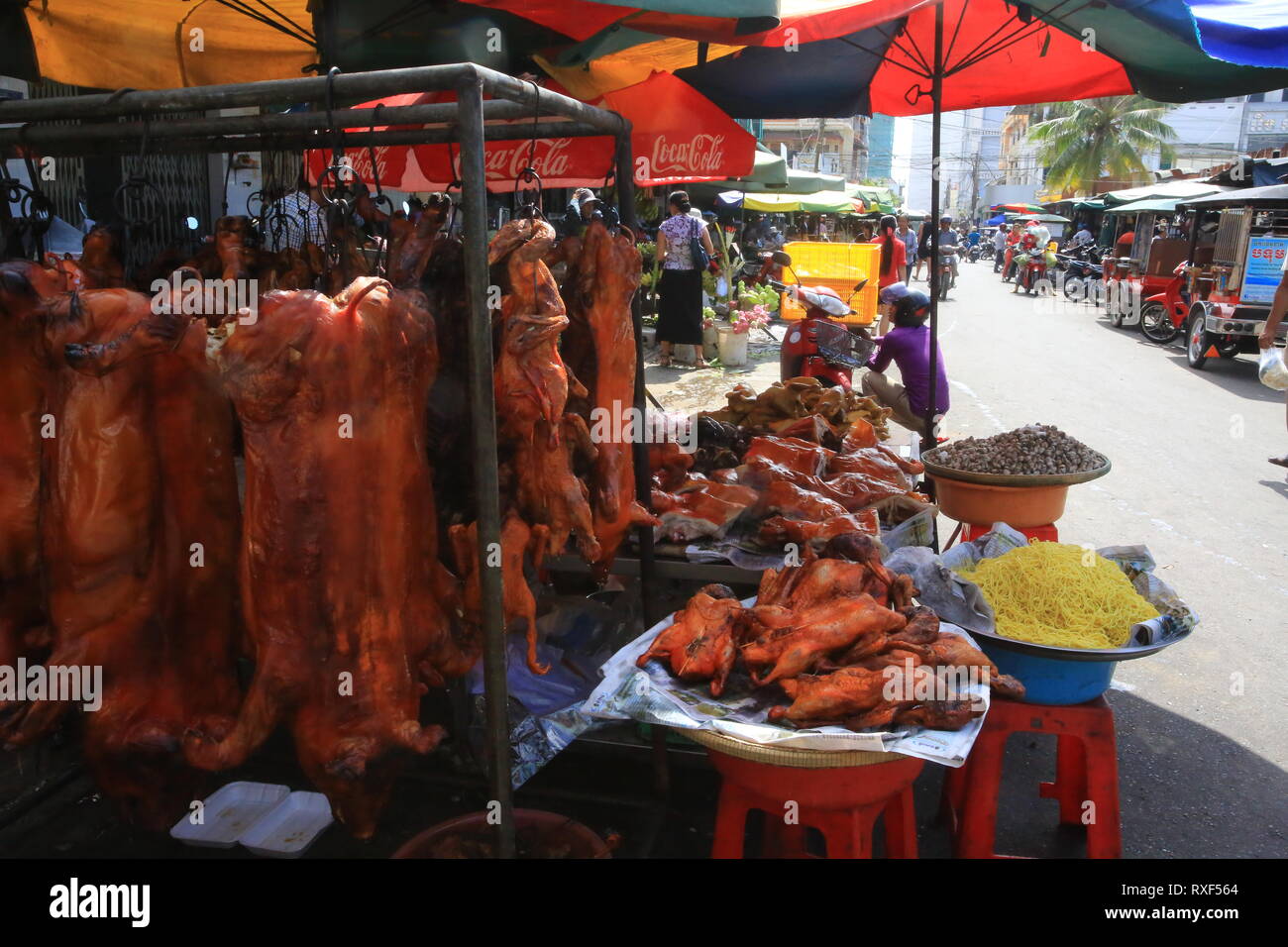 meat hawker in  russian market in phnom penh Stock Photo