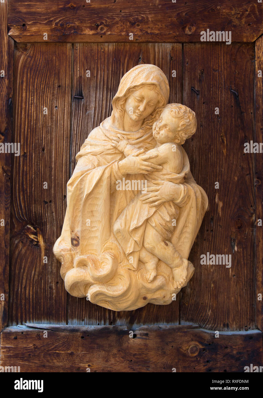 Madonna and Christ wood carving, Val Gardena, Dolomites, Italy Stock