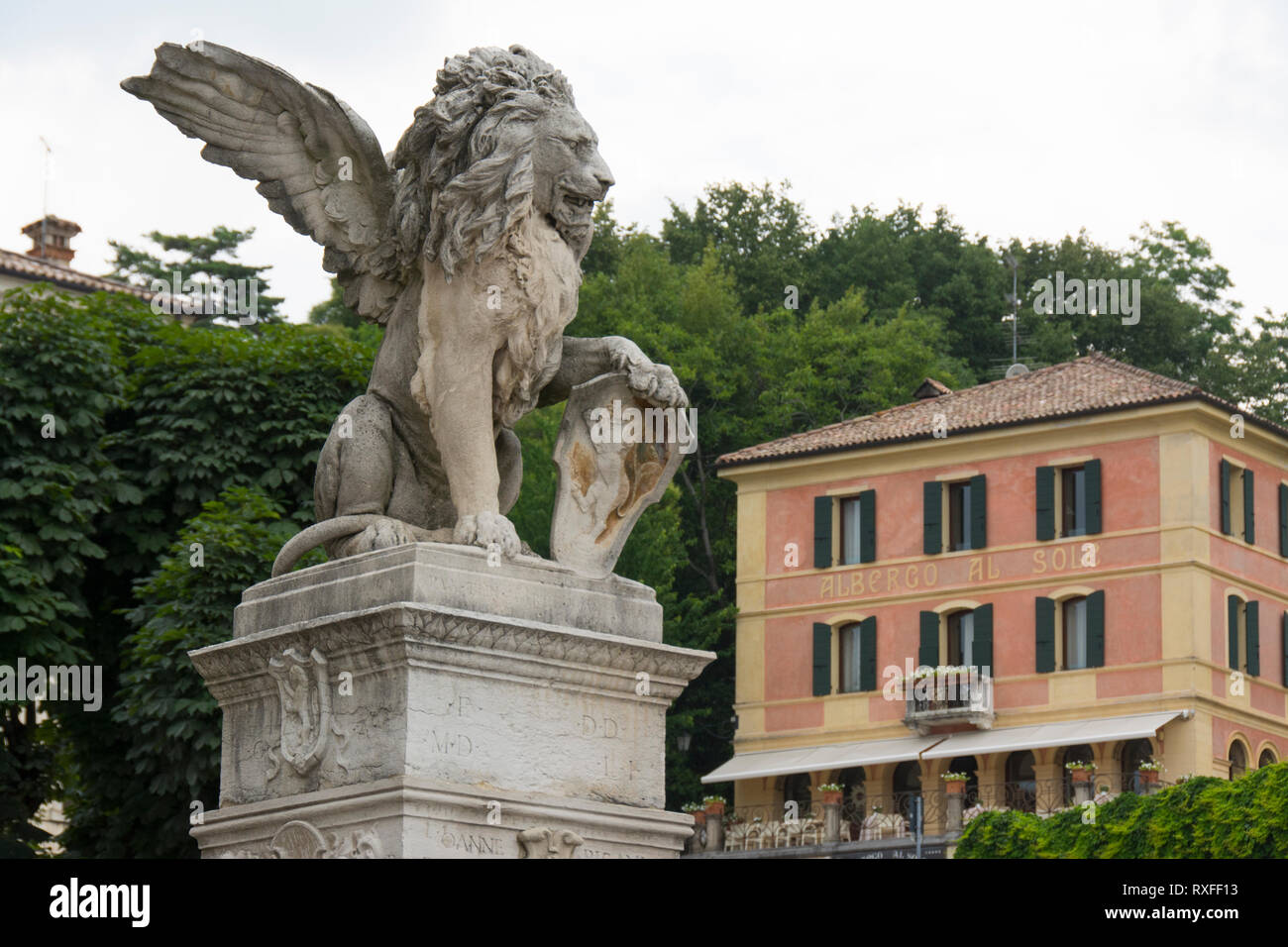 Winged lion, detail from fountain in Piazza Garibaldi, Asolo, Veneto, Italy Stock Photo