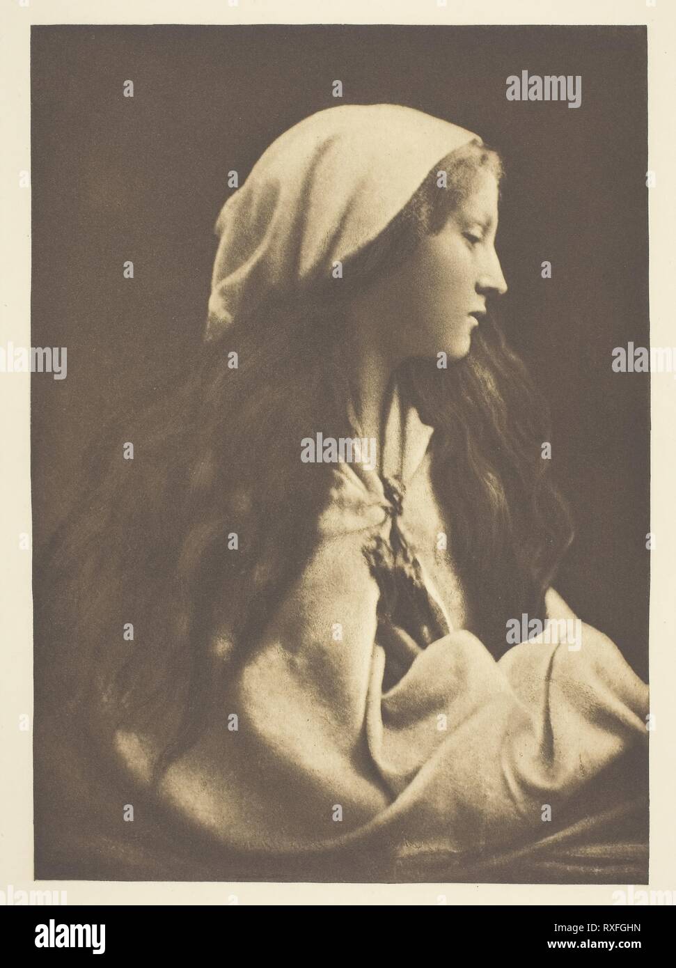 The Day Dream. Julia Margaret Cameron; English, 1815-1879. Date: 1869. Dimensions: 21.6 × 15.5 cm (image); 38 × 28.2 cm (paper). Photogravure, from 'Sun Artists, Number 5' (1890). Origin: England. Museum: The Chicago Art Institute. Stock Photo