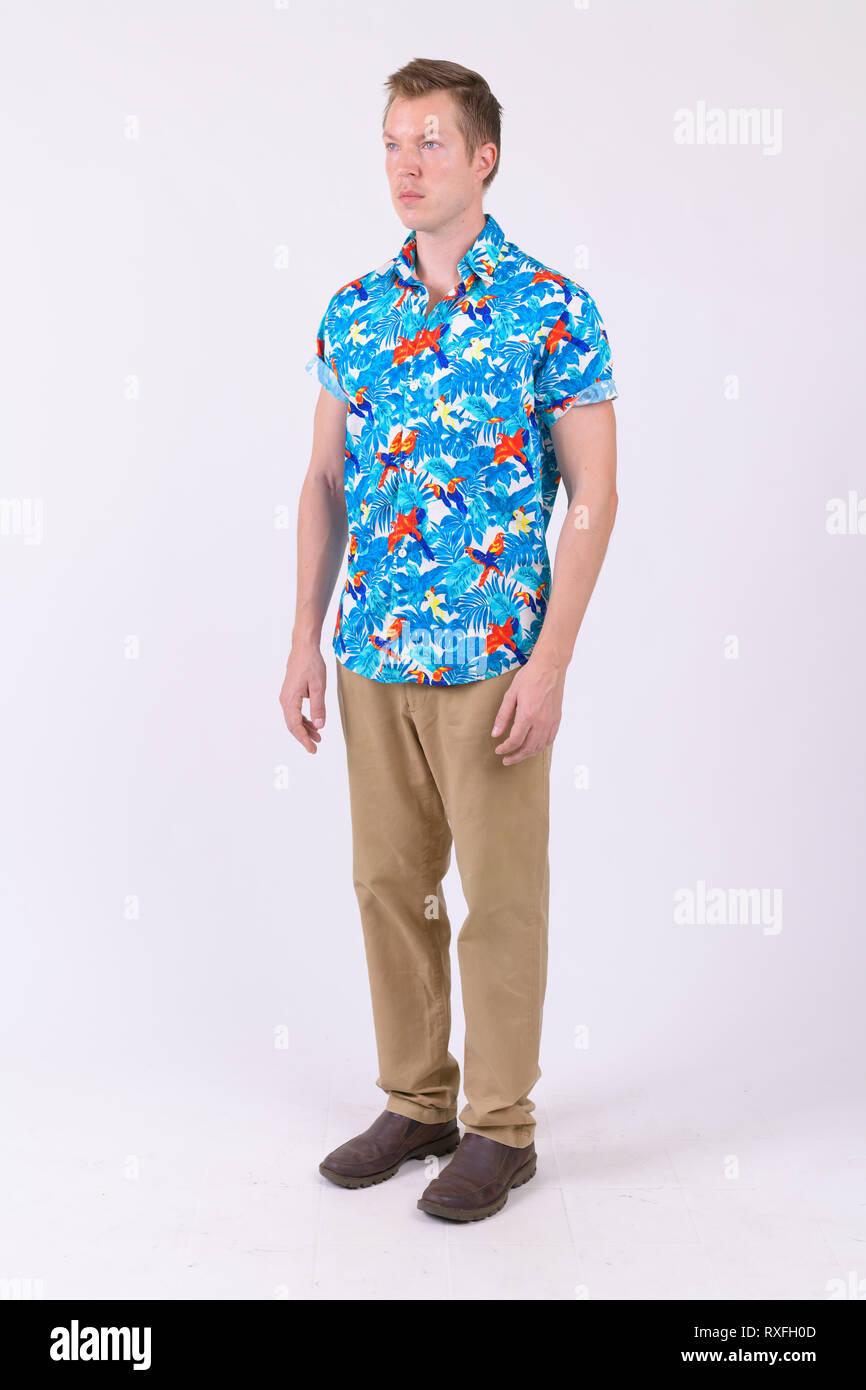 Full body shot of young handsome tourist man thinking Stock Photo - Alamy