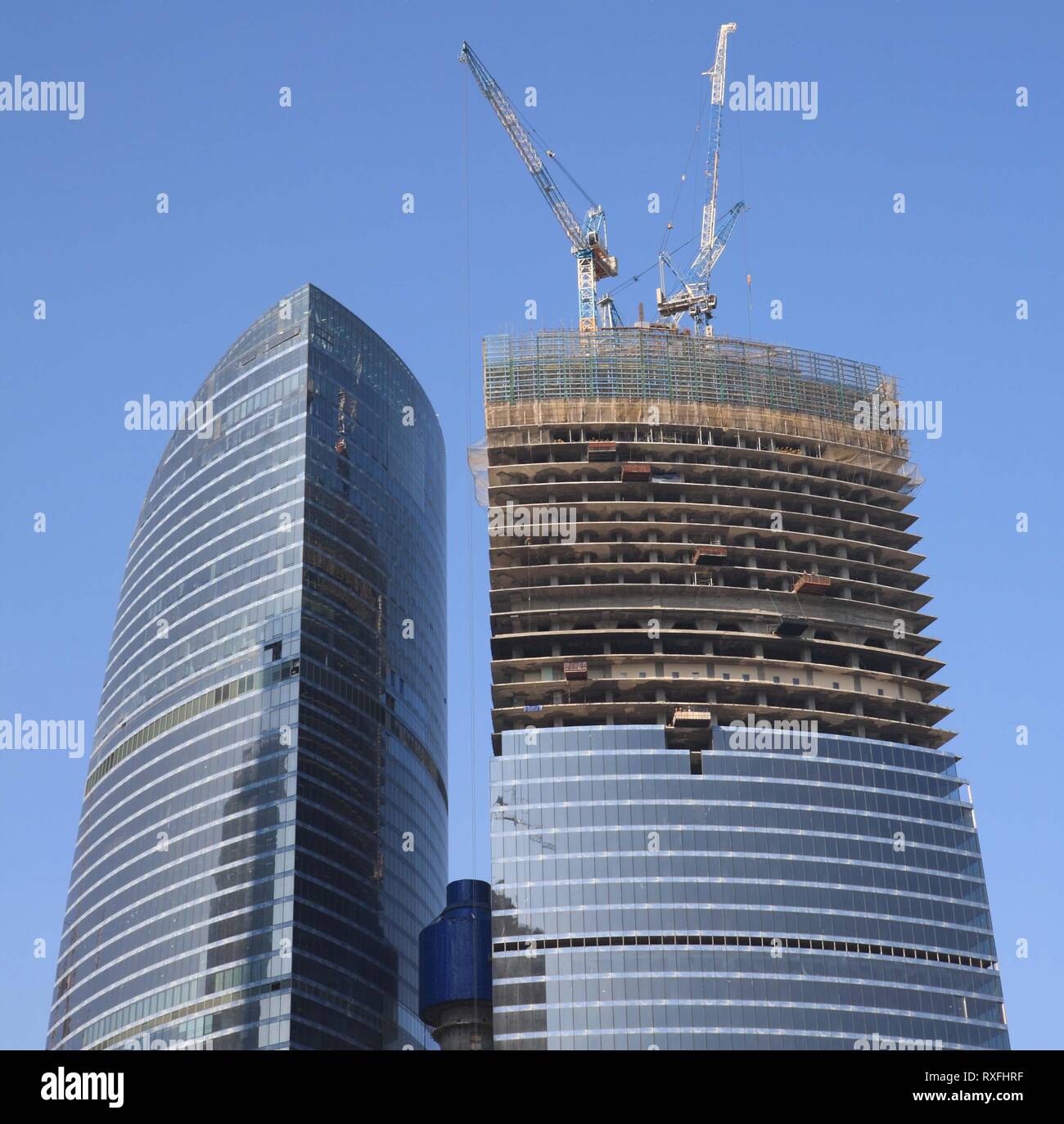 skyscraper develop on sky background at day Stock Photo - Alamy